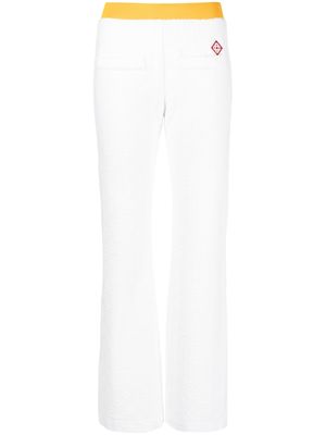Casablanca logo-debossed towelling trousers - White