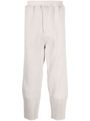 CFCL fully-pleated tapered track pants - Neutrals