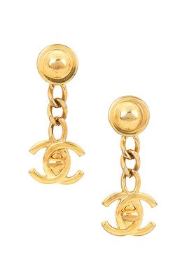 Chanel Coco Mark Turnlock Swing Earrings in Metallic Gold