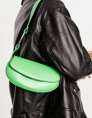 Charles & Keith curved cross body bag in green