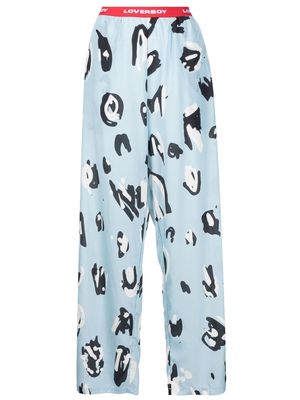 Charles Jeffrey Loverboy abstract-print logo-waist trousers - Blue