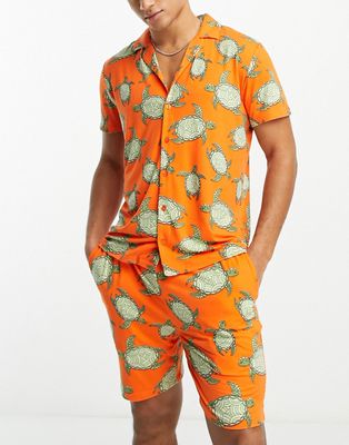 Chelsea Peers short pajama set in orange turtle print