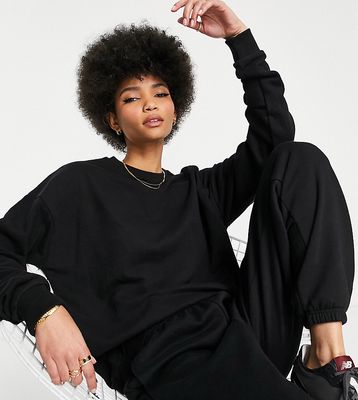 Chelsea Peers Tall oversized high neck sweatshirt with woven logo tab in black