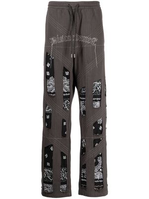 Children Of The Discordance embroidered cotton track pants - Grey