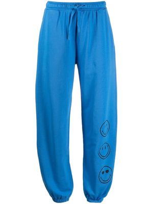 Chinti and Parker smiley-print track pants - Blue