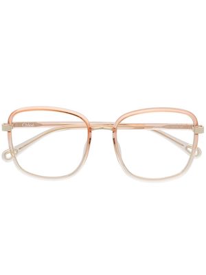 Chloé Eyewear oversize transparent-effect glasses - Orange