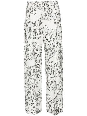 Christian Wijnants Pamir graphic-print trousers - White