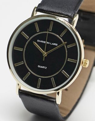 Christin Lars large face minimal watch in black and gold
