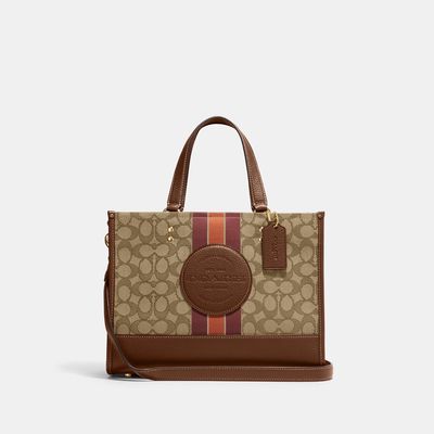 Coach Outlet Dempsey Carryall In Signature Jacquard With Stripe And Coach Patch - Brown