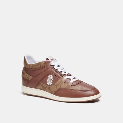Coach Outlet Mid Top Sneaker In Signature Canvas - Brown