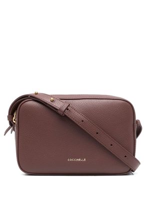 Coccinelle logo-plaque leather satchel bag - Brown