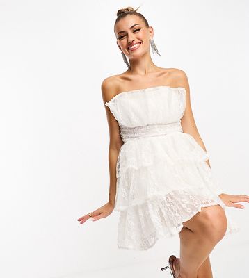 Collective the Label exclusive tiered ruffle lace mini dress in white