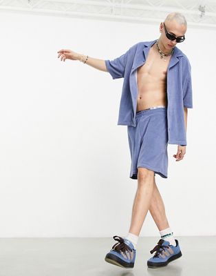 COLLUSION branded terrycloth beach shorts in blue - part of a set