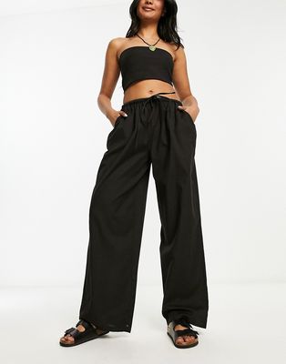 COLLUSION low rise linen beach pants in black