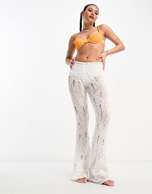 COLLUSION mid rise flared crochet beach pants in white