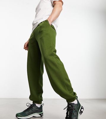COLLUSION sweatpants with embroidered logo in dark green