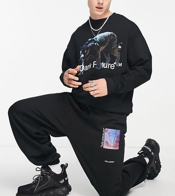 COLLUSION sweatpants with photographic text print in black