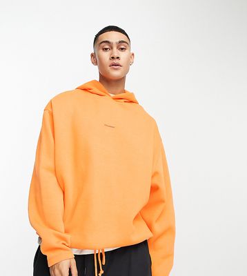 COLLUSION tie hem hoodie in bright orange
