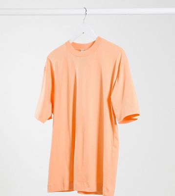 COLLUSION Unisex t-shirt in orange