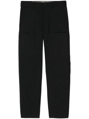 Comme des Garçons Homme Deux tapered patchwork trousers - Black