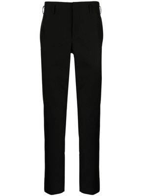 Comme Des Garçons Homme Plus pressed-crease tailored trousers - Black