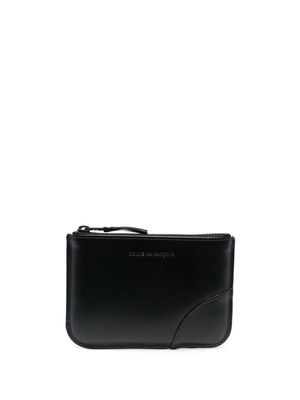 Comme Des Garçons Wallet logo-debossed leather pouch - Black