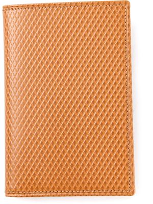 Comme Des Garçons Wallet textured bi-fold wallet - Neutrals