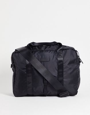 Consigned diagonal zip carryall with taping in black