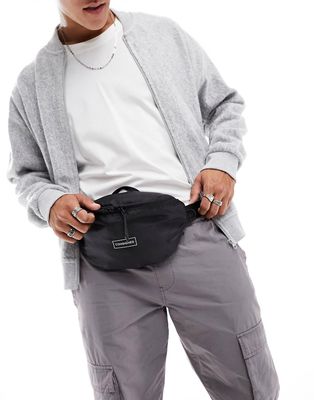 Consigned zip top fanny pack in black