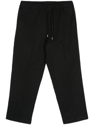 Costumein elasticated-waist tapered trousers - Black