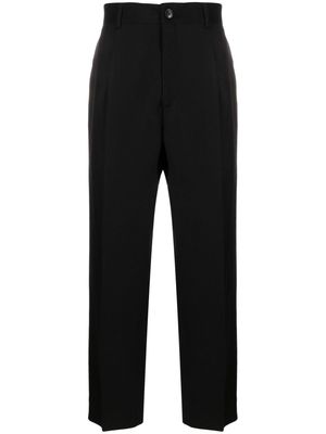 Costumein tailored-cut virgin-wool trousers - Black