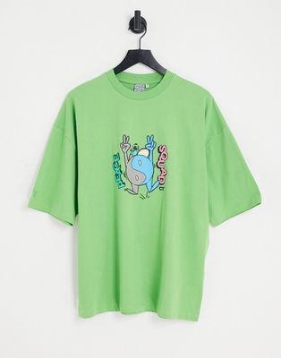 Crooked Tongues oversized T-shirt with peace squad CT man graphic print in green