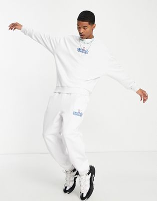 Crooked Tongues relaxed sweatpants with gnome logo print in white