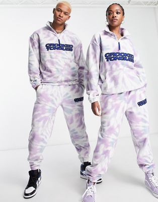 Crooked Tongues unisex relaxed sweatpants in all over print tie dye polar fleece with embroidered logo in lilac-Purple