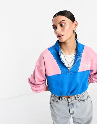 Daisy Street Active Neon 1/4 zip long sleeve cropped sweatshirt in pink