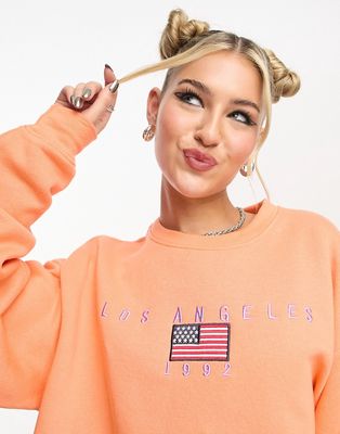 Daisy Street relaxed sweatshirt in apricot with LA embroidery-Orange