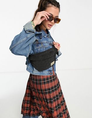 Damson Madder padded fanny pack in black with floral stitching
