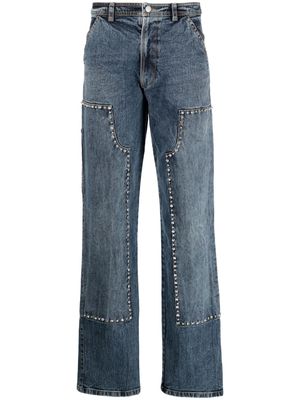 DES PHEMMES logo-patch stud-embellished wide-leg jeans - Blue