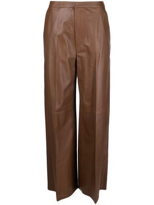 Desa 1972 pressed-crease leather palazzo trousers - Brown