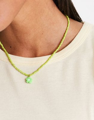 DesignB London festival green beaded necklace with flower pendant