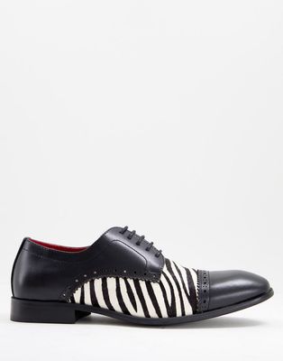 Devils Advocate lace up derby shoes in black and zebra