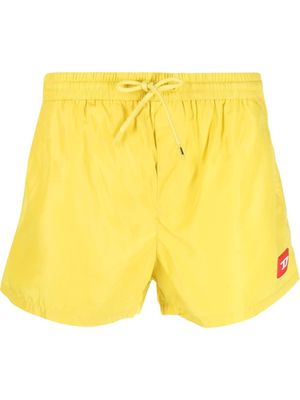 Diesel Cay Bay logo-patch swim shorts - Yellow