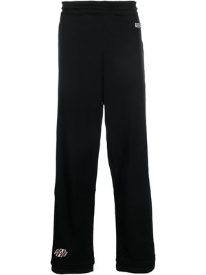 Diesel side-stripe logo track pants - Black