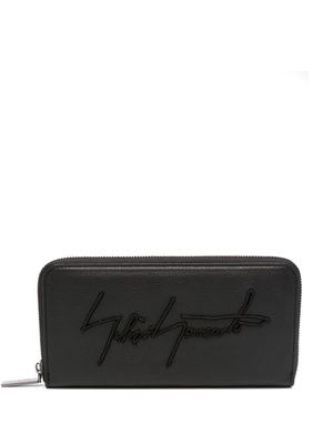 Discord Yohji Yamamoto logo-embossed leather wallet - Black