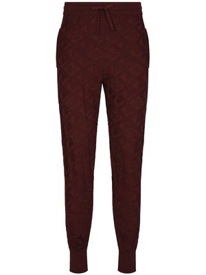 Dolce & Gabbana 3D-jacquard silk track pants - Red