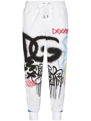 Dolce & Gabbana all-over graphic print track pants - White