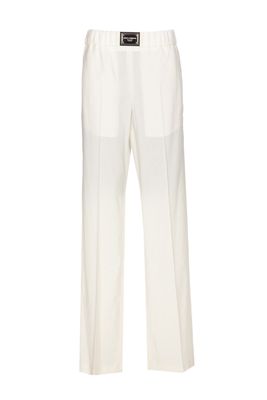 Dolce & Gabbana Flare Trousers With Logo Plaque