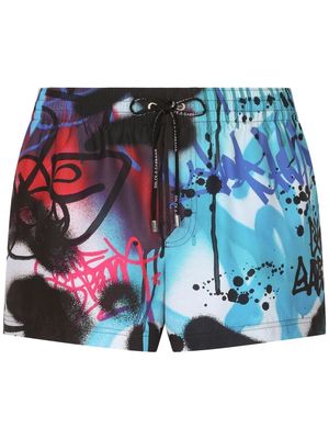Dolce & Gabbana graffiti-print swimming shorts - Blue