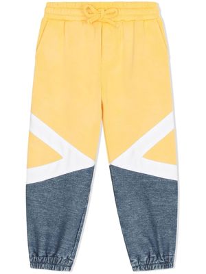 Dolce & Gabbana Kids colour-block logo track pants - Yellow
