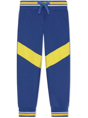 Dolce & Gabbana Kids diagonal-stripe cotton track pants - Blue